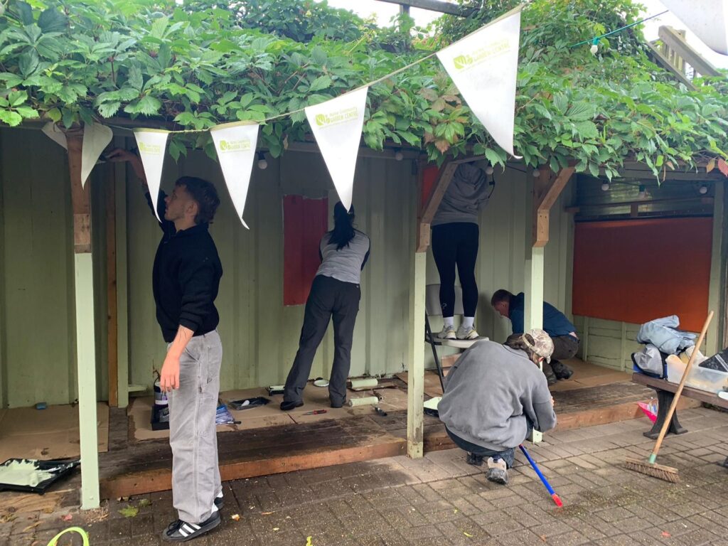 Exercising our corporate social responsibility by refurbishing a veranda at Hulme Community Garden Centre